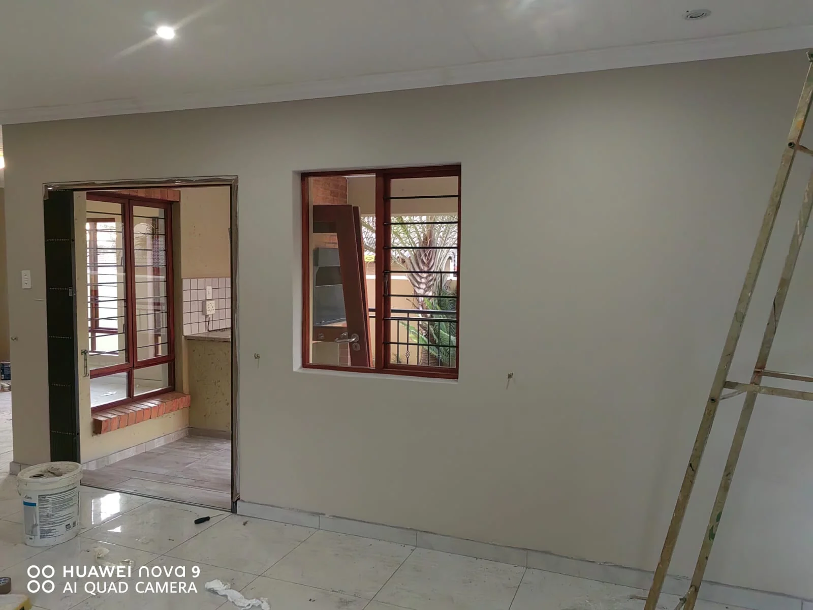 Professional interior painting showing a beautifully painted modern living room with fresh neutral tones